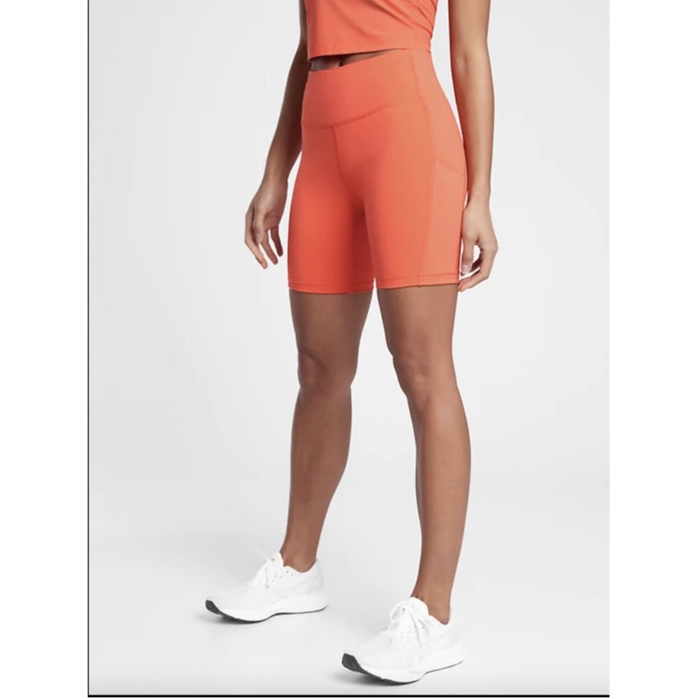 Athleta Ultimate Stash Pocket 7” Shorts Size XXS Orange Bike Shorts